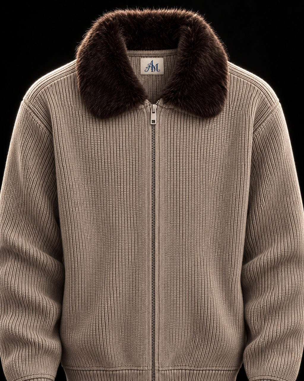 The Engadin Zip Knit on black, with woven AM neck label