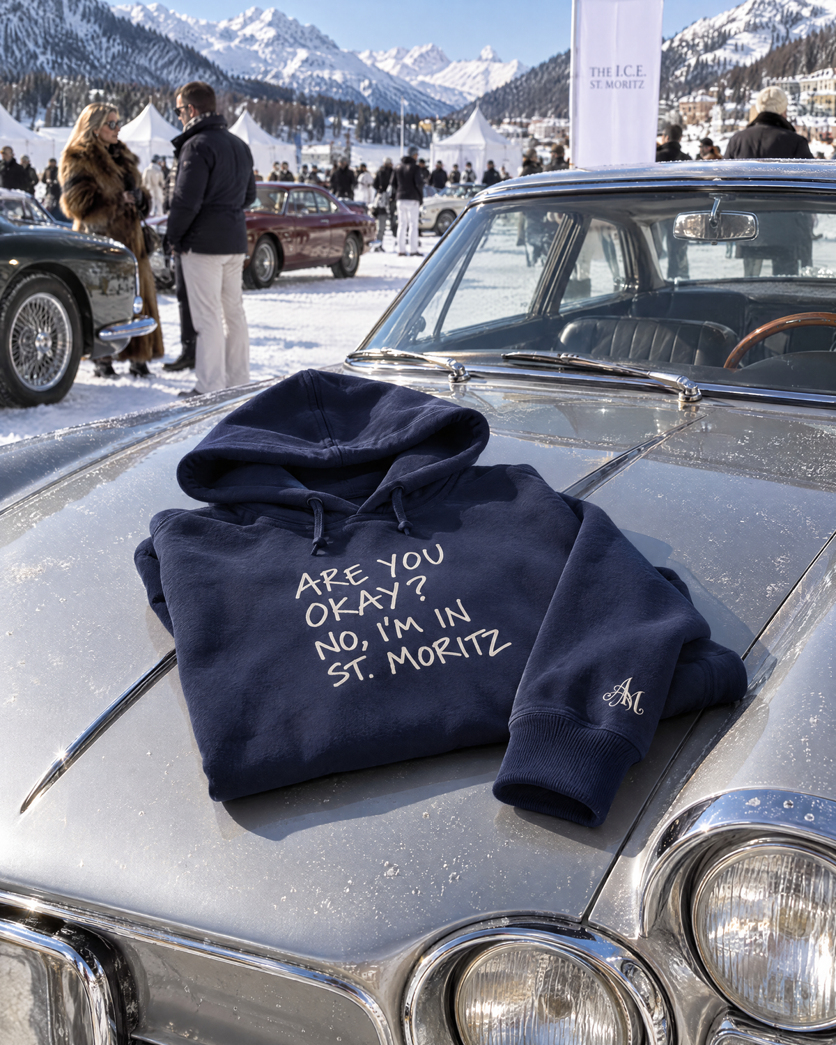 Navy hoodie on a classic car at The I.C.E. St. Moritz
