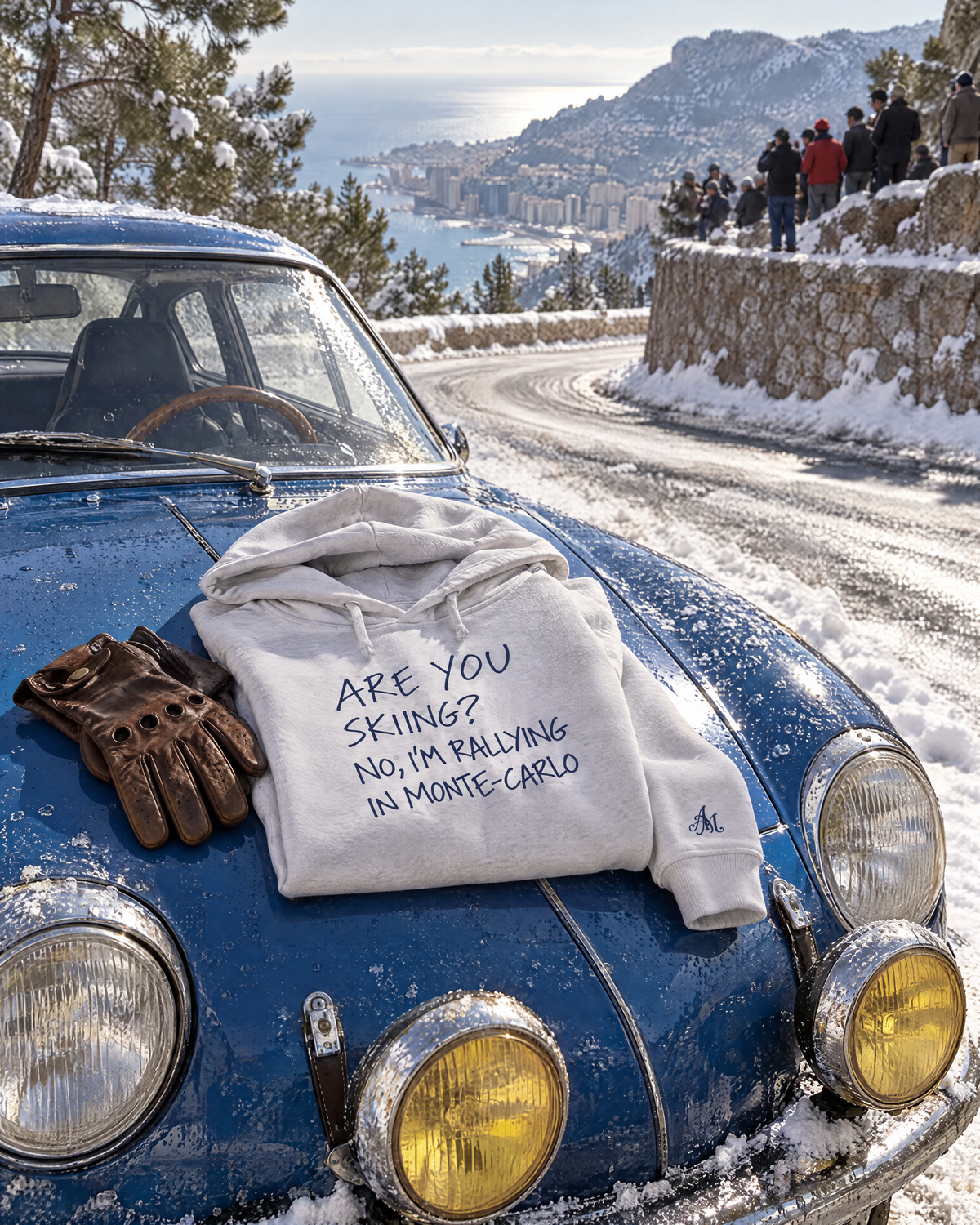 Heather grey hoodie on a vintage rally car above Monaco