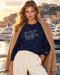 Model in navy crewneck embroidered You met me at a very Monegasque time in my life at Port Hercule, Monaco